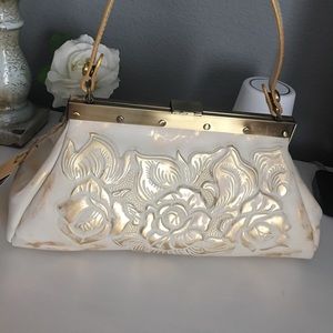 Never used metallic rose Patricia Nash purse